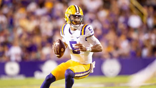 Tigers Quarterback Jayden Daniels 5 runs the ball as the LSU Tigers take on the Auburn Tigers at Tiger Stadium in Baton Rouge, Louisiana, Saturday, Oct. 14, 2023.  